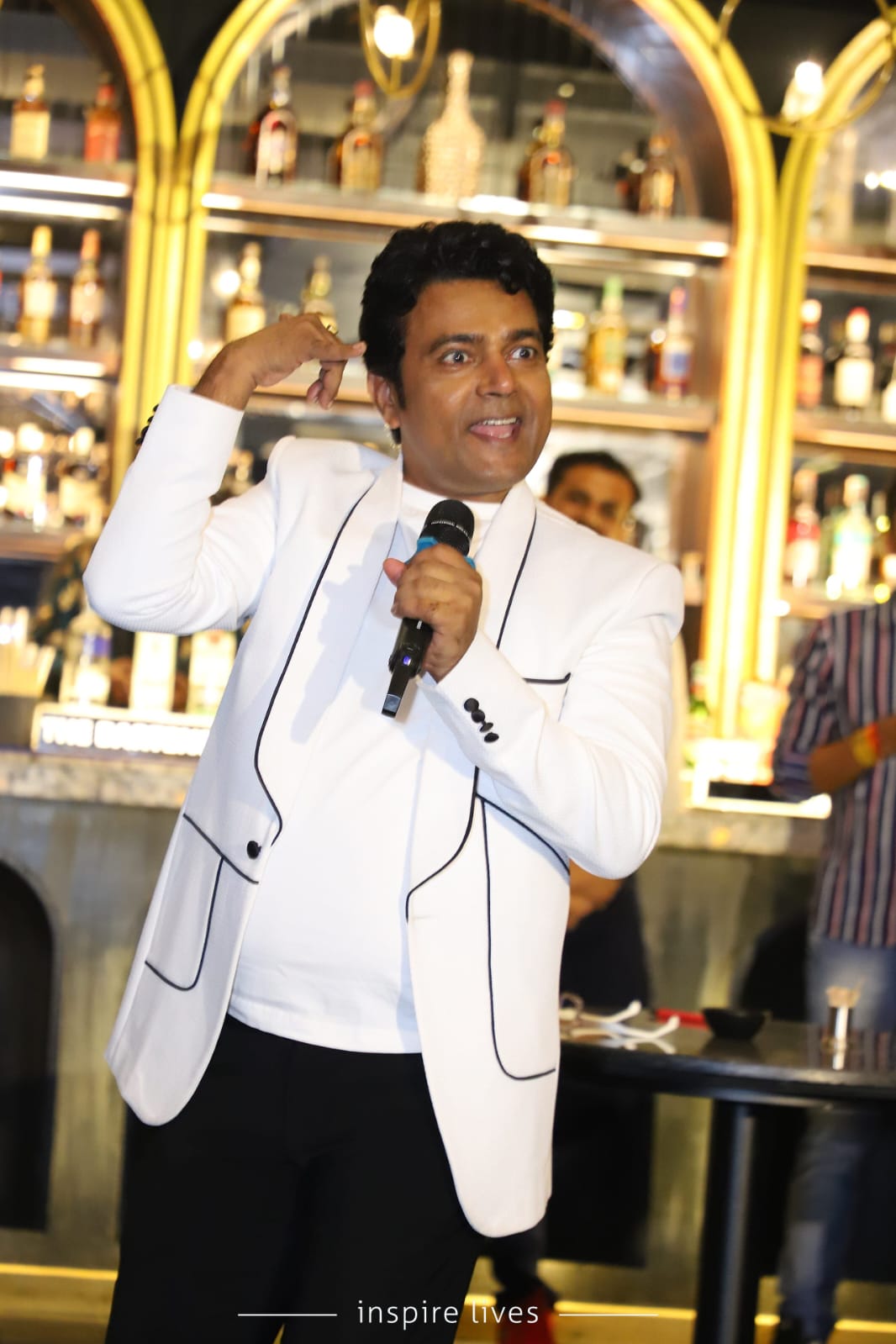 Navin Prabhakar delivering a solo stand-up performance
